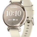 Ceas Garmin Lily 2, display AMOLED, dimensiune afisaj 35.4 mm, rezolutie afisaj 240 x 201 pixeli, memorie 8GB, autonomie pana la 5 zile, rezistanta la apa pana la 5 ATM, greutate: 24,4g, ramăCrem auriu, curea cafenie din material textil