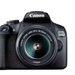 Camera foto Canon EOS-2000D kit, obiectiv EF-S 18-55mm f/3.5-5.6 fara stabilizare. 24.1MP,3.0" TFT fixed DIGIC 4+, ISO 100-6400,FullHD movies 30fps,compatibil SD/SDHC/SDXC, 30-1/4000 sec,9 puncte de focus, HDMI mini,USB,WI-FI, accumulator Li-ion LP-E10, montura EF/EF-S.